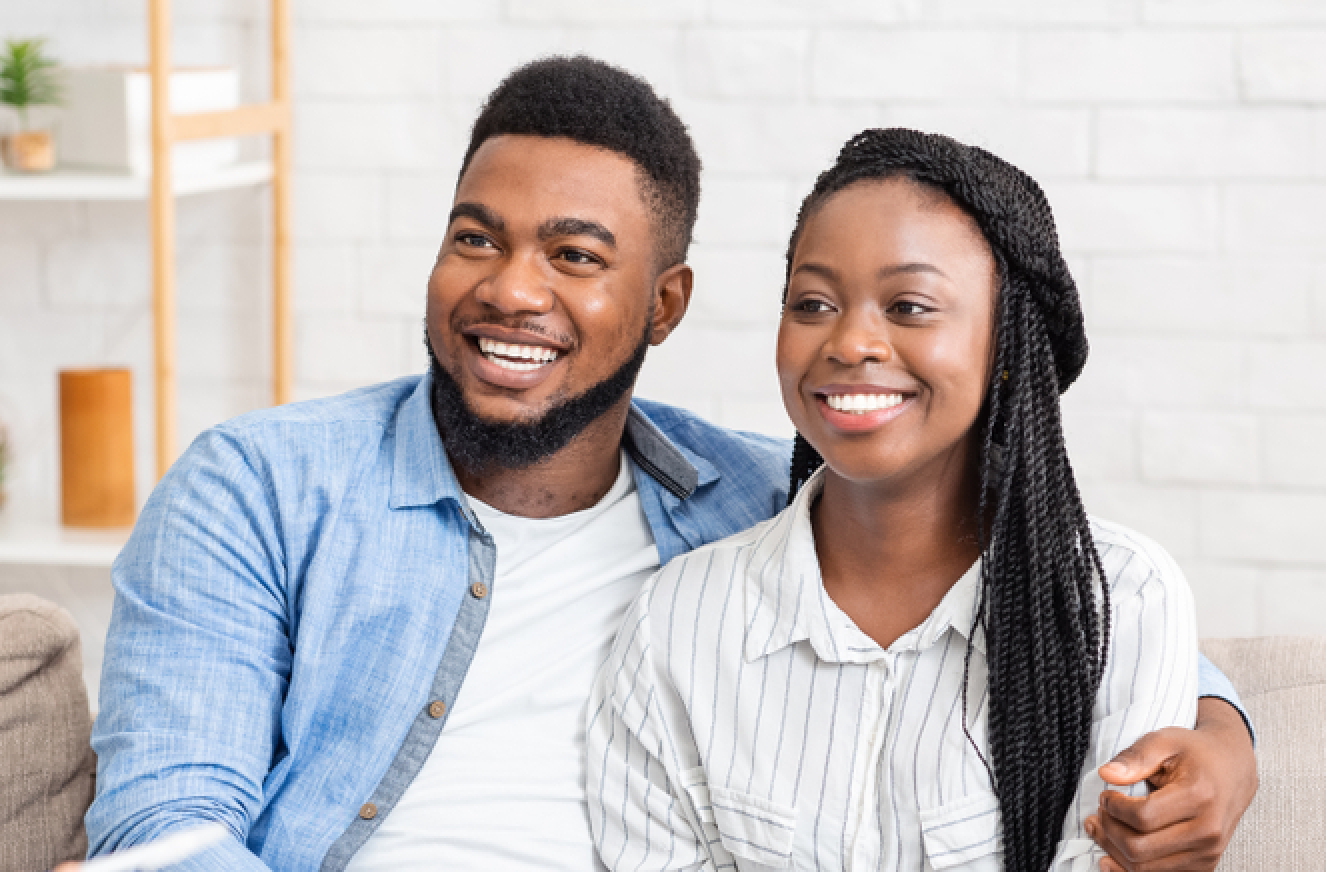 Two partners sitting together, beginning couples therapy
